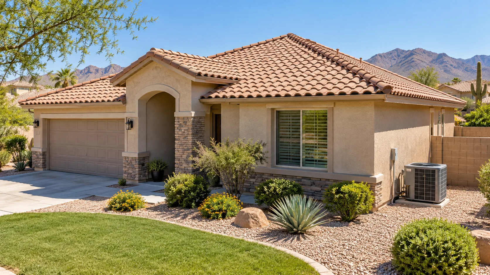 Arizona home with a well-maintained tile roof and an outdoor air-conditioning unit